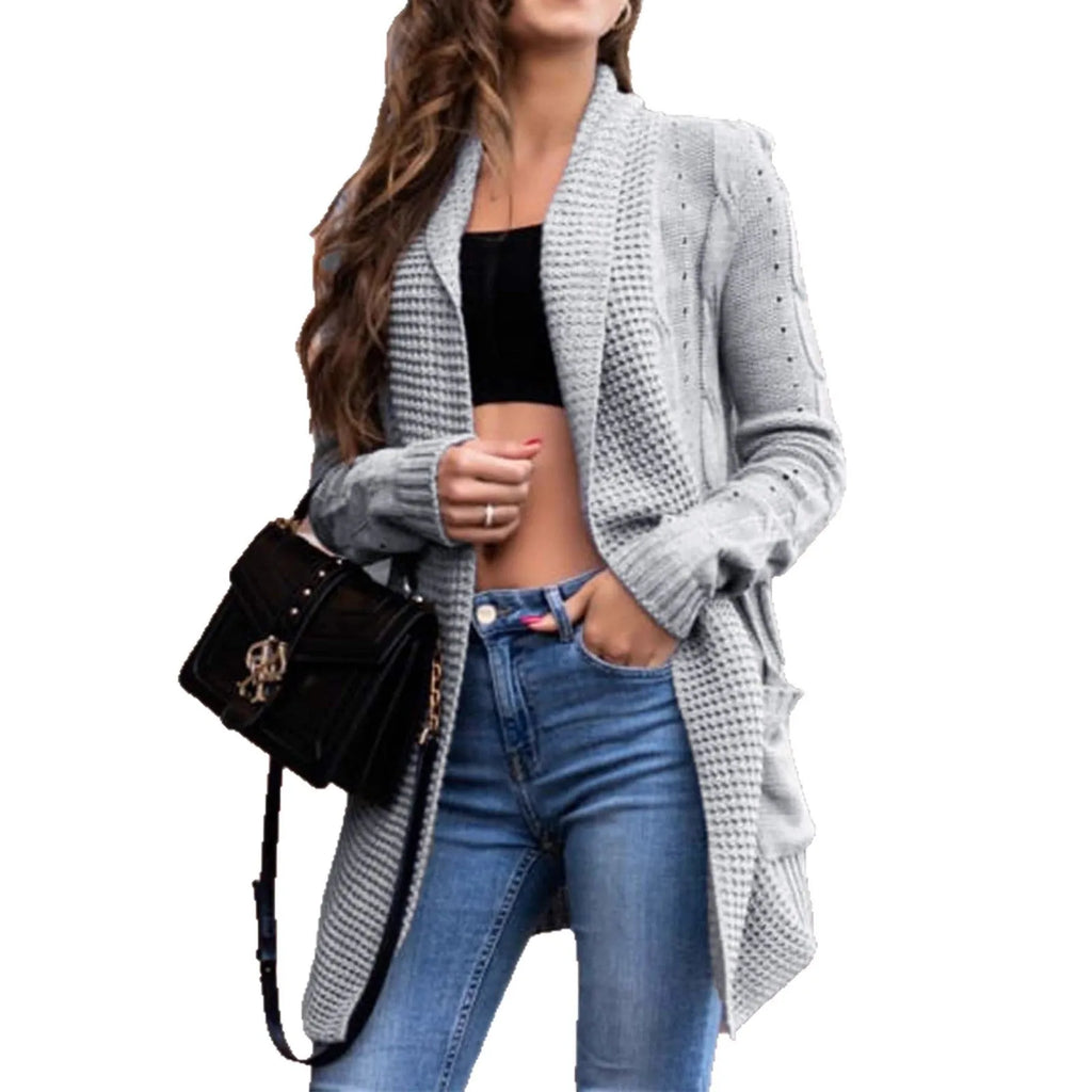 A grey women's loose-fit cardigan coat with pockets and long sleeves.