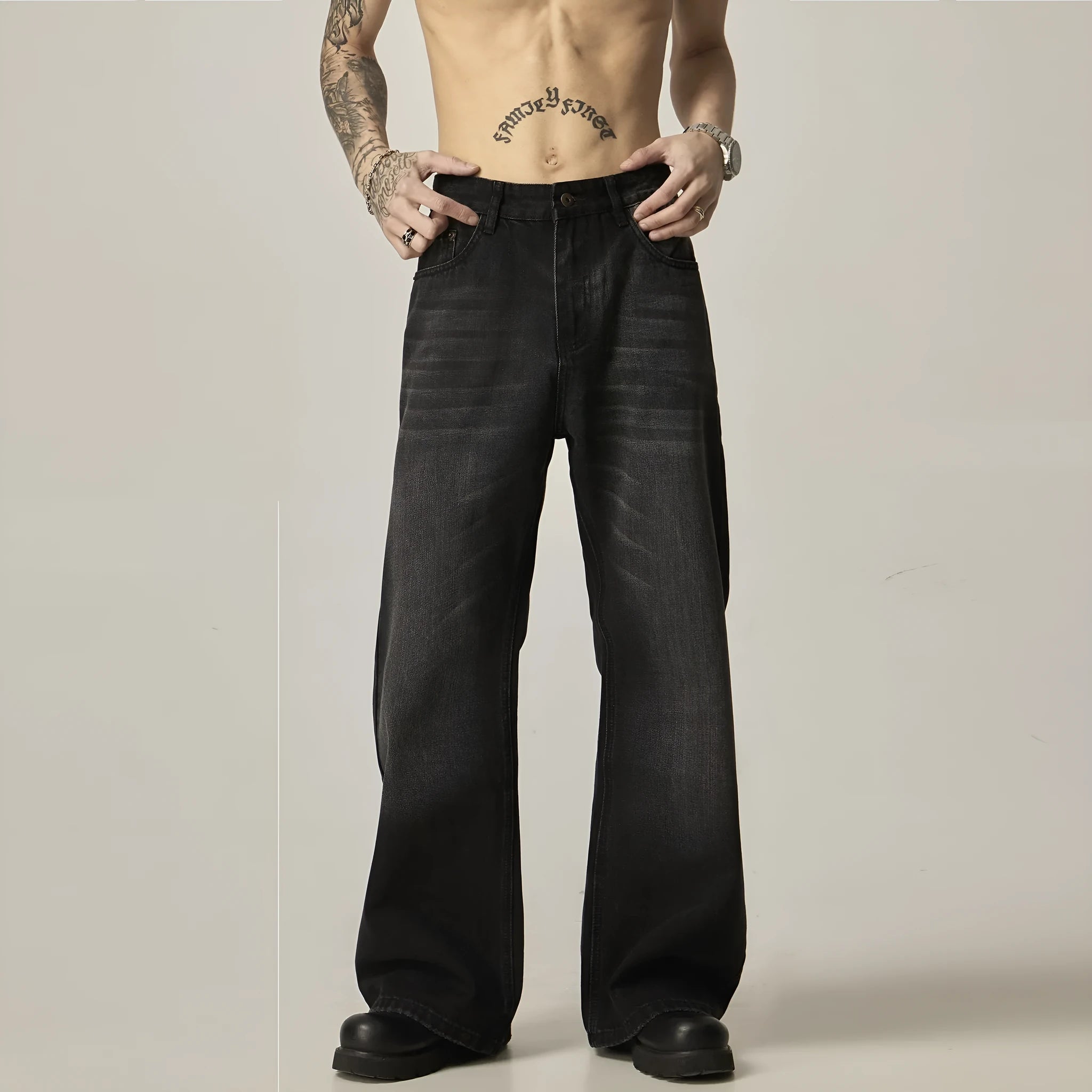 Black loose straight leg men's jeans with retro styling and zipper fly