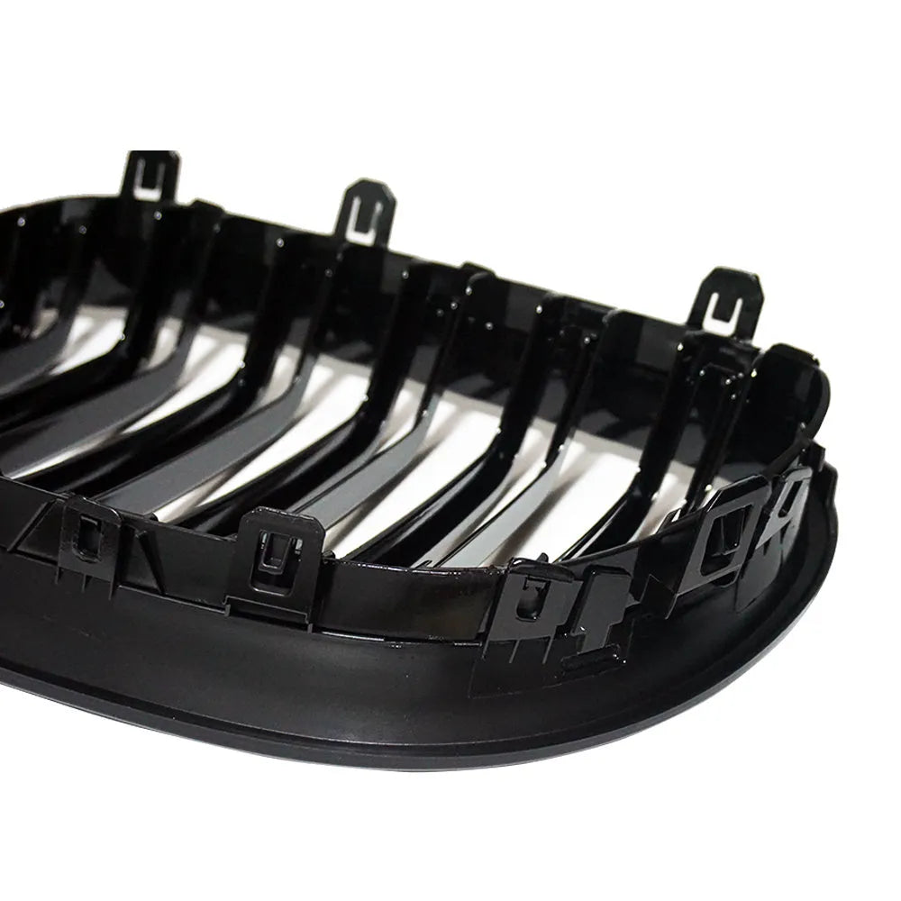 Pair of black ABS carbon fibre texture front grilles for BMW 5-Series E39 E60 E66 models.