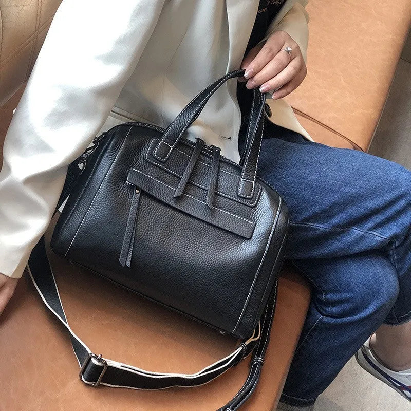 Genuine leather messenger bag with Boston lychee pattern stitching showing horizontal square shape and shoulder strap