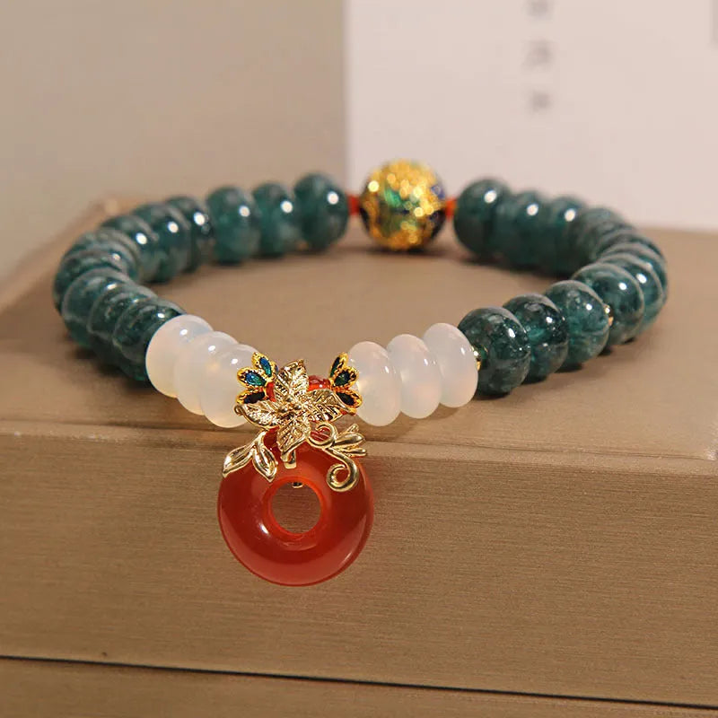 Blue water jade abacus bead crystal bracelet with red agate peace buckle and rhinestone details