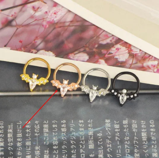 Closed-loop bat nose ring in stainless steel electroplated silver finish with star shape and moon elements