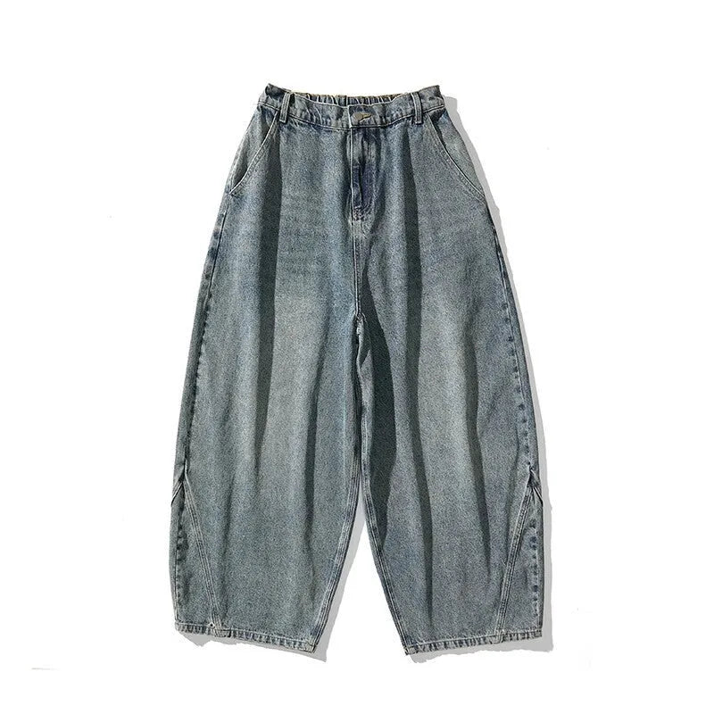 Men's plus size baggy jeans in dark blue denim with a straight leg and low waist.