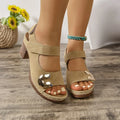 Women's light brown Velcro-strap Roman sandals with a round toe and rubber sole.