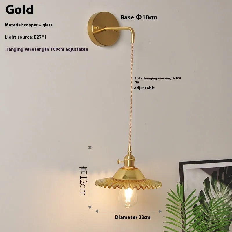 Retro copper lotus wall lamp with glass shade in choice of six colours, suspended from a wall