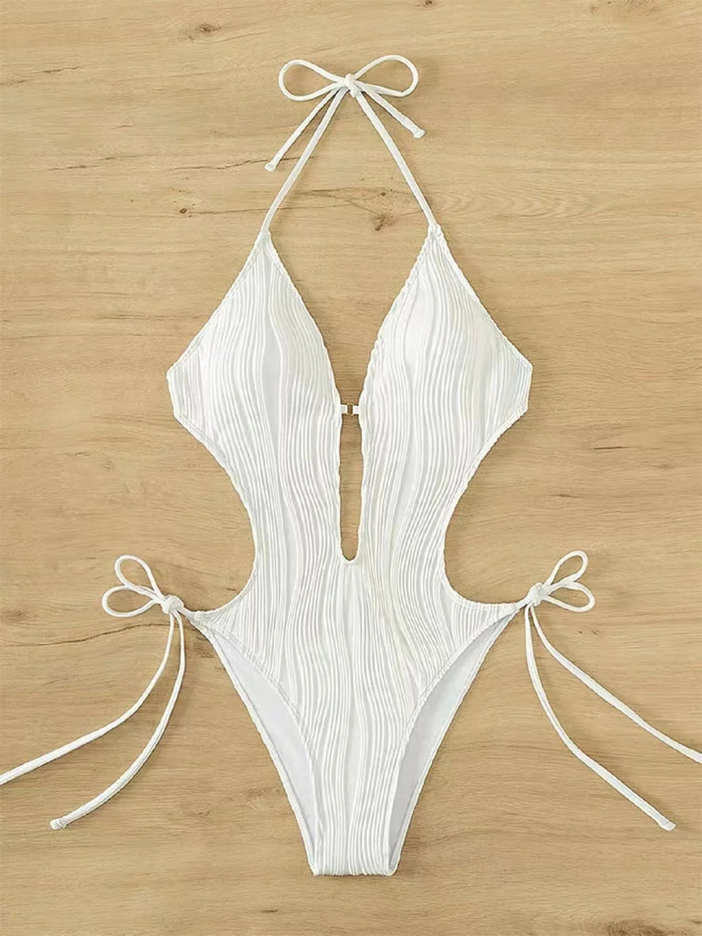Women's black lace-up triangle bikini swimsuit with solid colour design