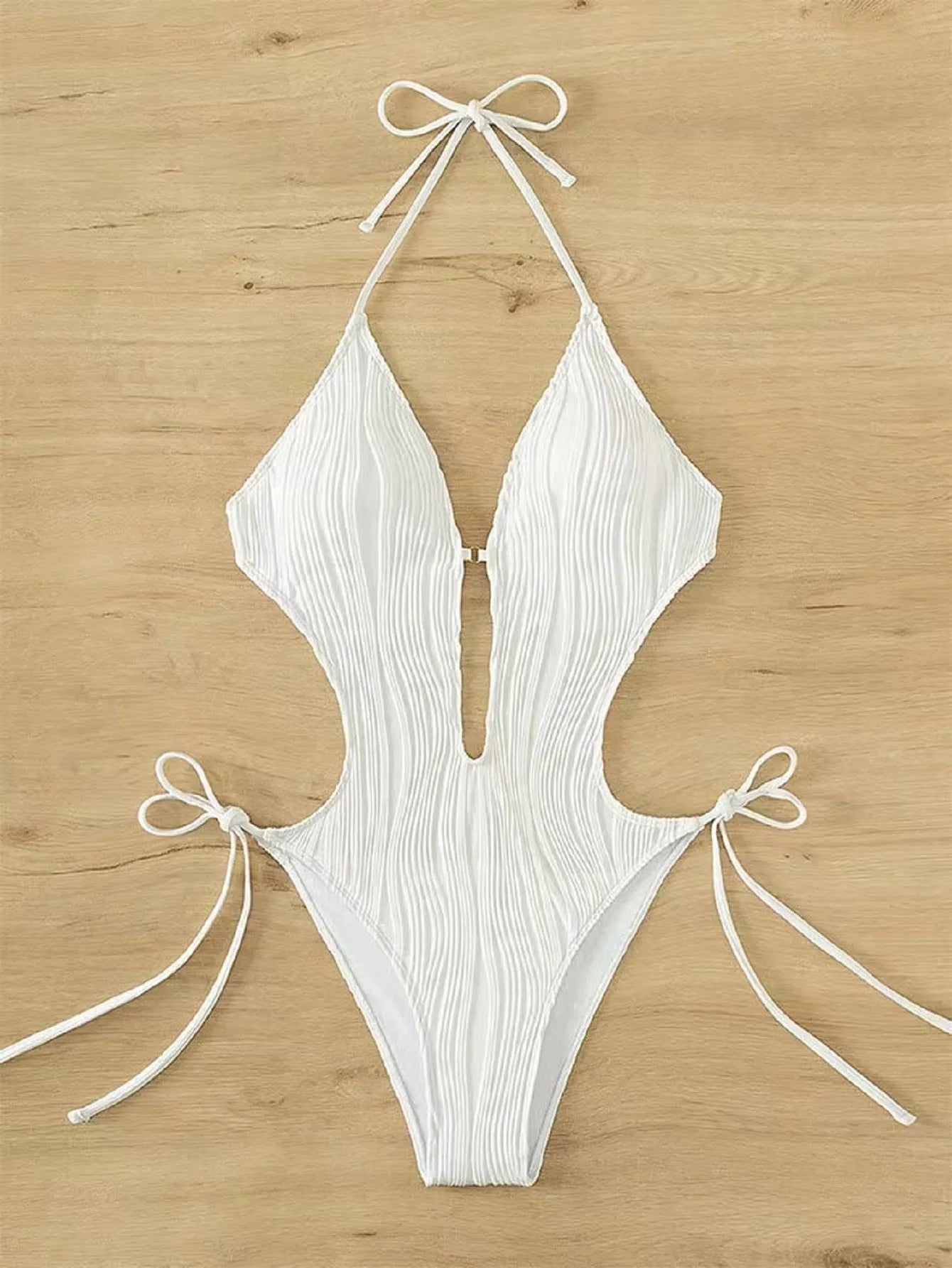Women's black lace-up triangle bikini swimsuit with solid colour design