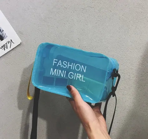 Clear square jelly shoulder bag with adjustable strap in various colours on a white background.