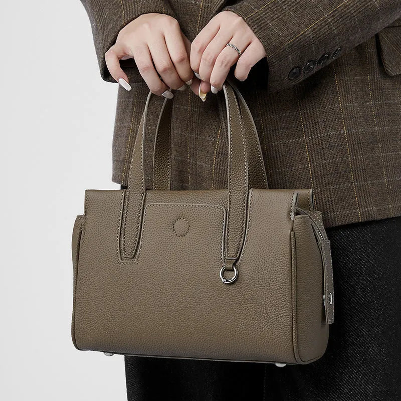 Genuine leather large-capacity crossbody bag in horizontal square shape in black colour with shoulder strap