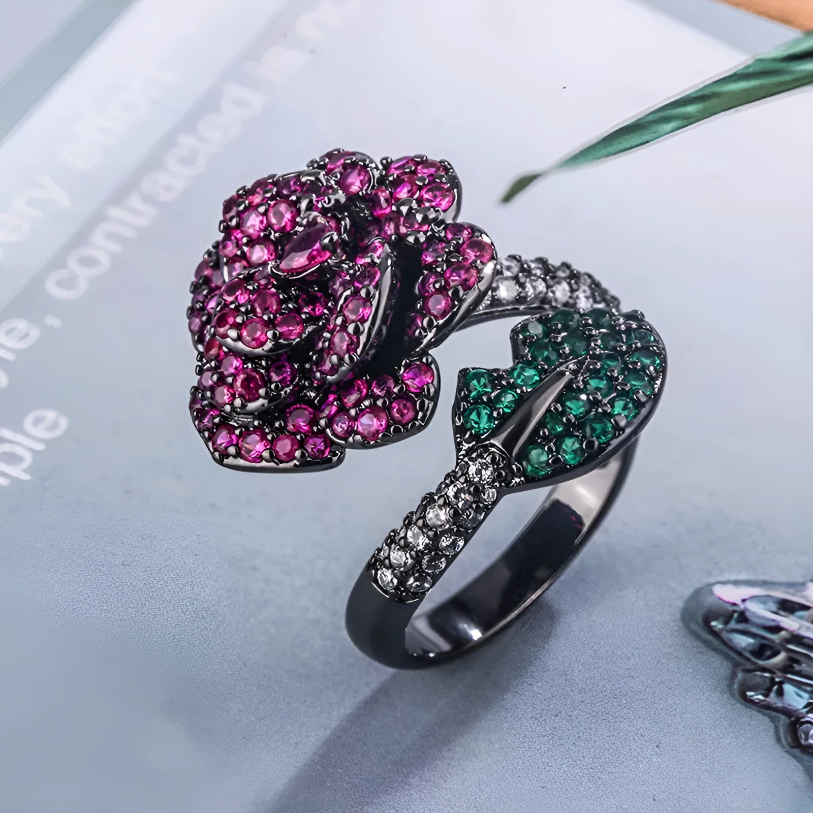 Women's black gold geometric flower personality ring with simulated red corundum stone