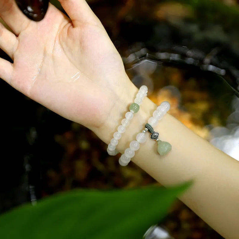 Women's bracelet with S925 silver and white agate Hetian jade in geometric lotus design