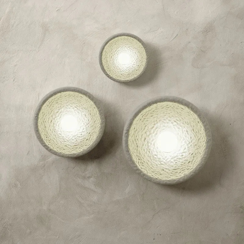 Japanese-style minimalist resin wall lamp in warm light, showing size options.