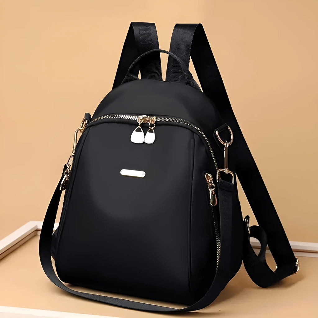 Women's Oxford cloth casual travel backpack in urban simplicity style with sewing line detail and sandwich pocket