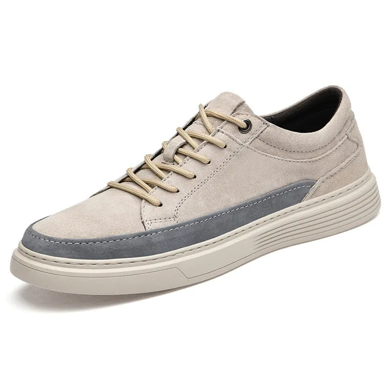 Men's grey casual leather skate shoes with round toe, low top design and rubber soles
