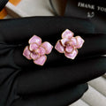 Gold plated purple flower stud earrings with oil-spot glaze finish and fresh style