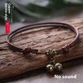 Adjustable nylon dog collar with brass buckle or bell in black, red, or coffee rope colour.
