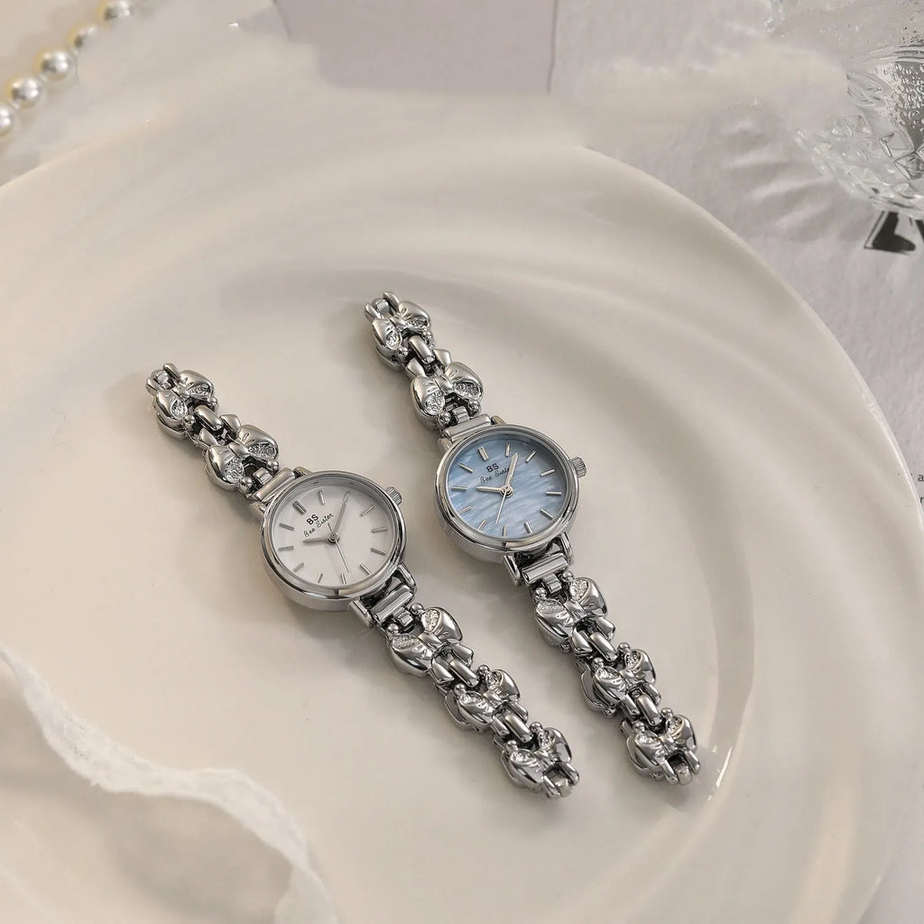 Women's retro French style alloy watch with 7mm slim case in golden white finish