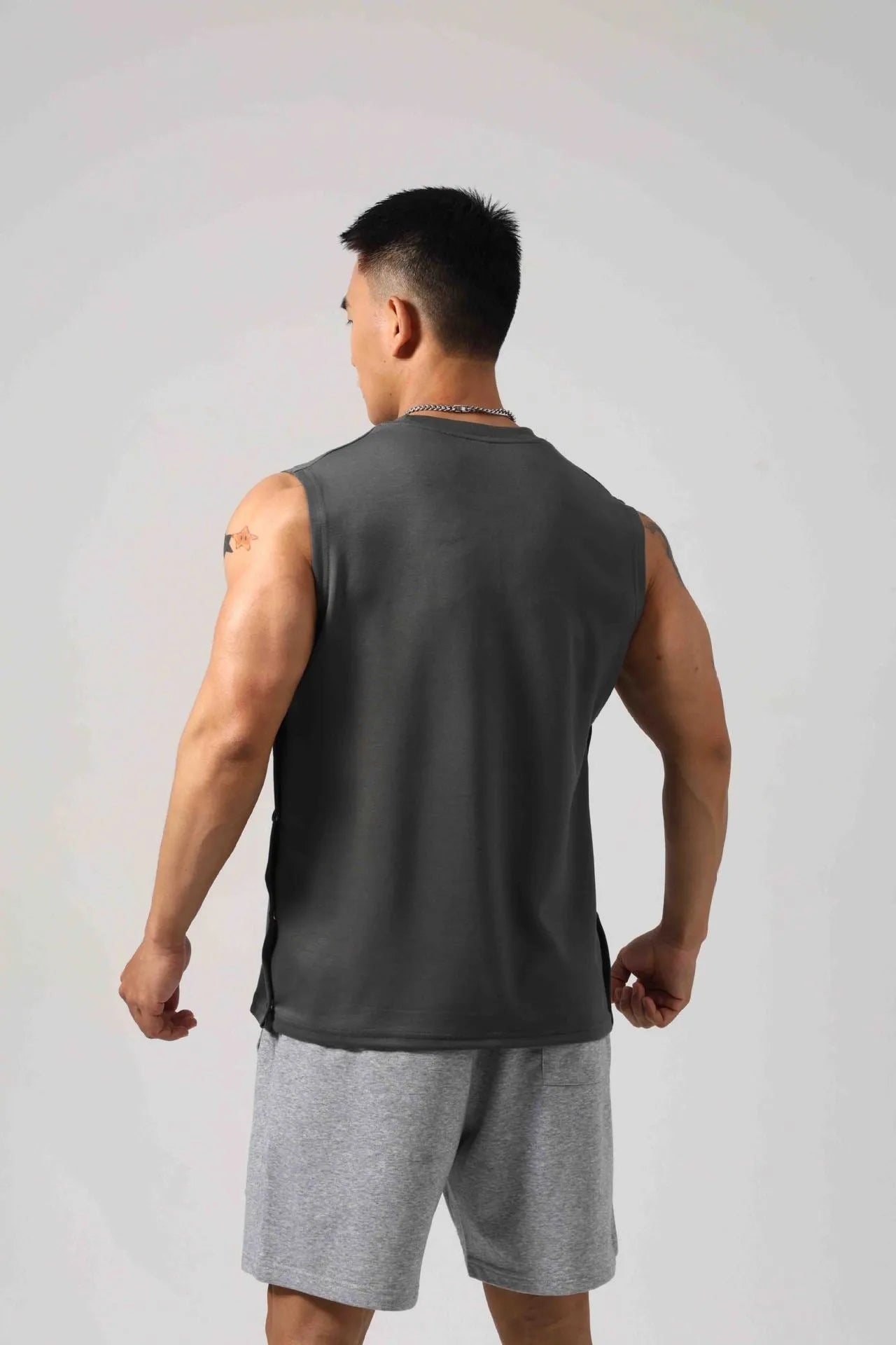 Korean style cotton fitness vest with hidden hook side openings in black colour
