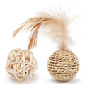 Two cat toys: a natural rattan ball and a colourful faux feather ball with a bell on a white background.