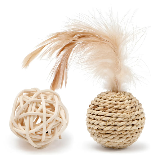 Two cat toys: a natural rattan ball and a colourful faux feather ball with a bell on a white background.