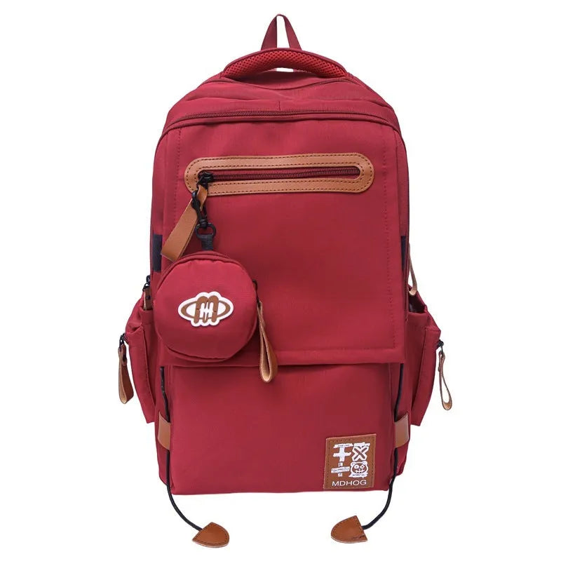 Japanese large capacity leisure travel backpack in khaki with contrast stitching and nylon waterproof finish