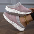 Women's black flyknit semi-slipper sock shoes with striped pattern and hollowed-out sewing lines on a lightweight sole.
