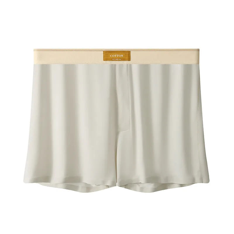 Men's solid colour loose Ice Silk underwear briefs on a neutral background