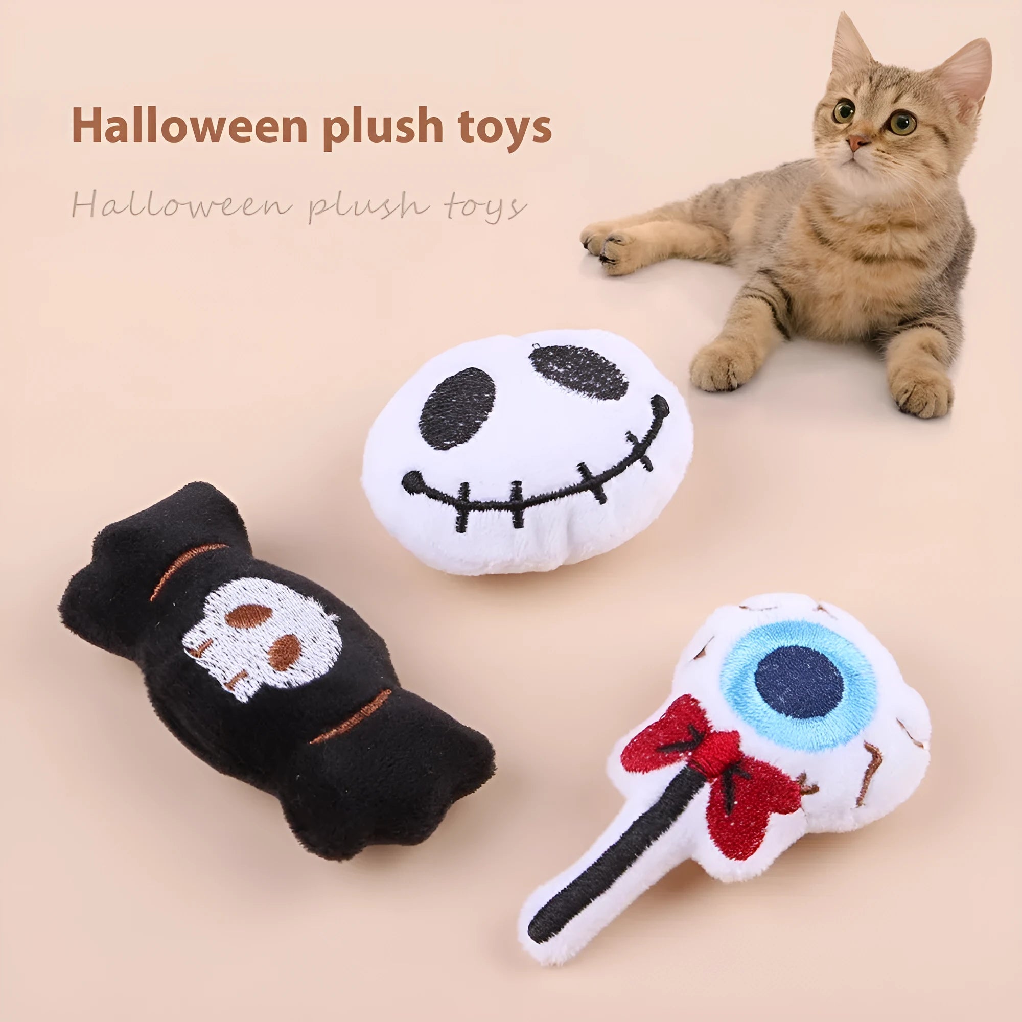 Plush cat teaser toy with three interchangeable heads: eyes, candy, and skull designs