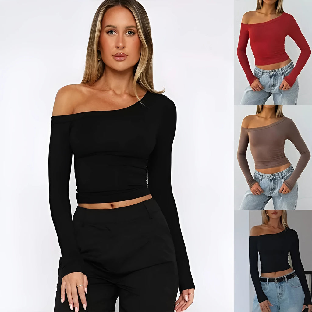 Women's black slim fit knitted cardigan with long sleeves and cross shoulder strap detail.