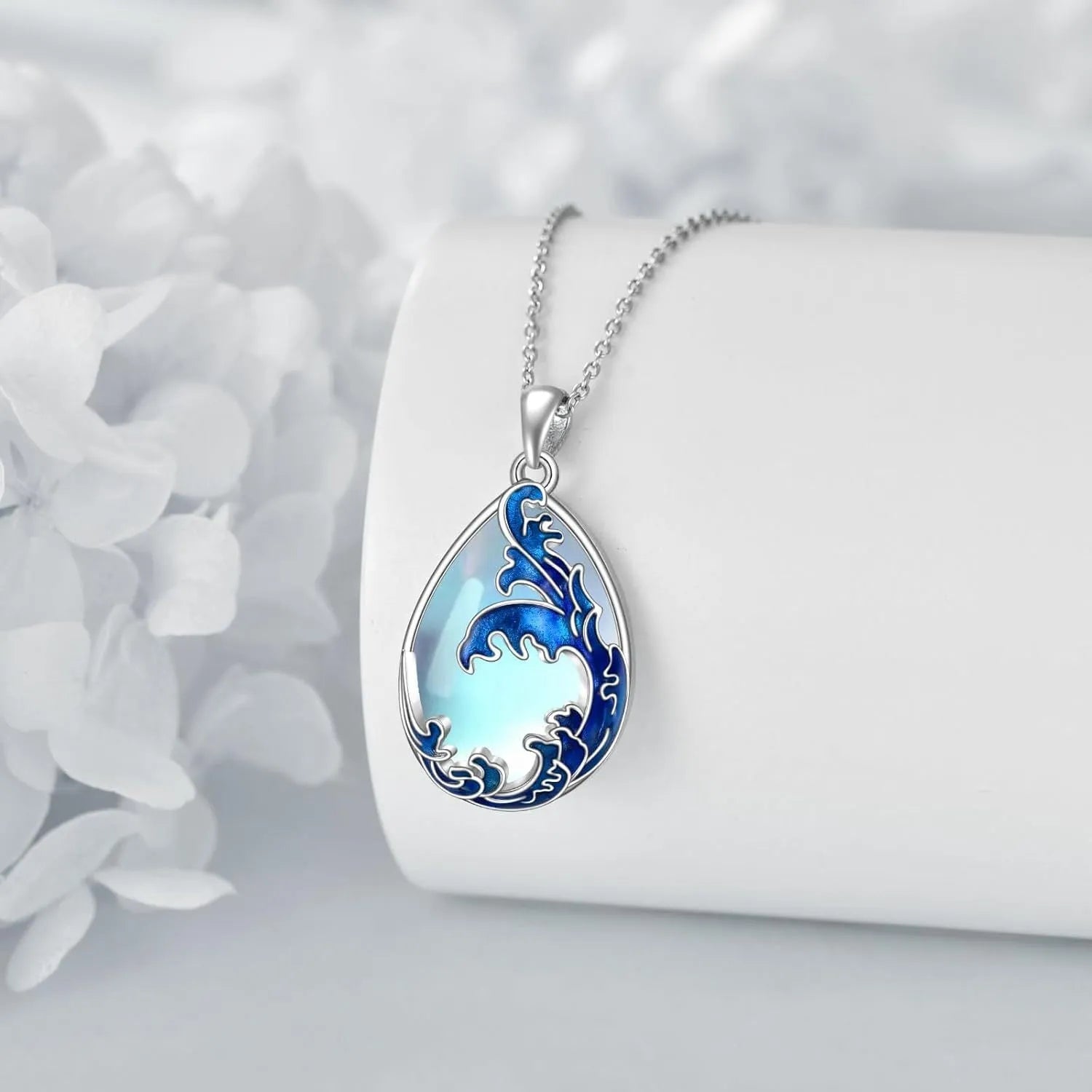 Blue heart-shaped alloy pendant on a chain, a women's necklace.