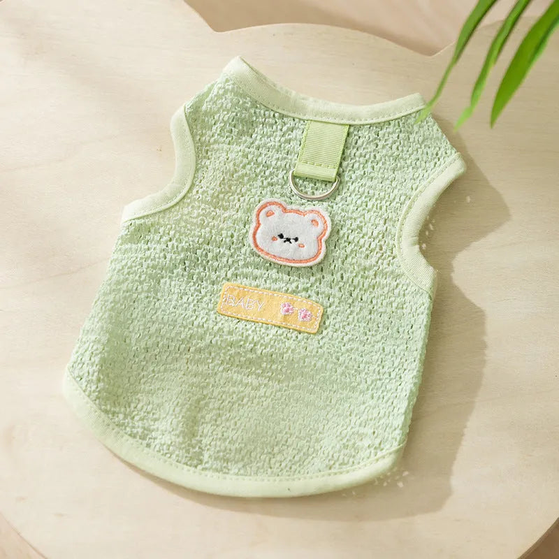 Colourful knitted cat clothes with a bear patch, showing hollowed-out breathable fabric.