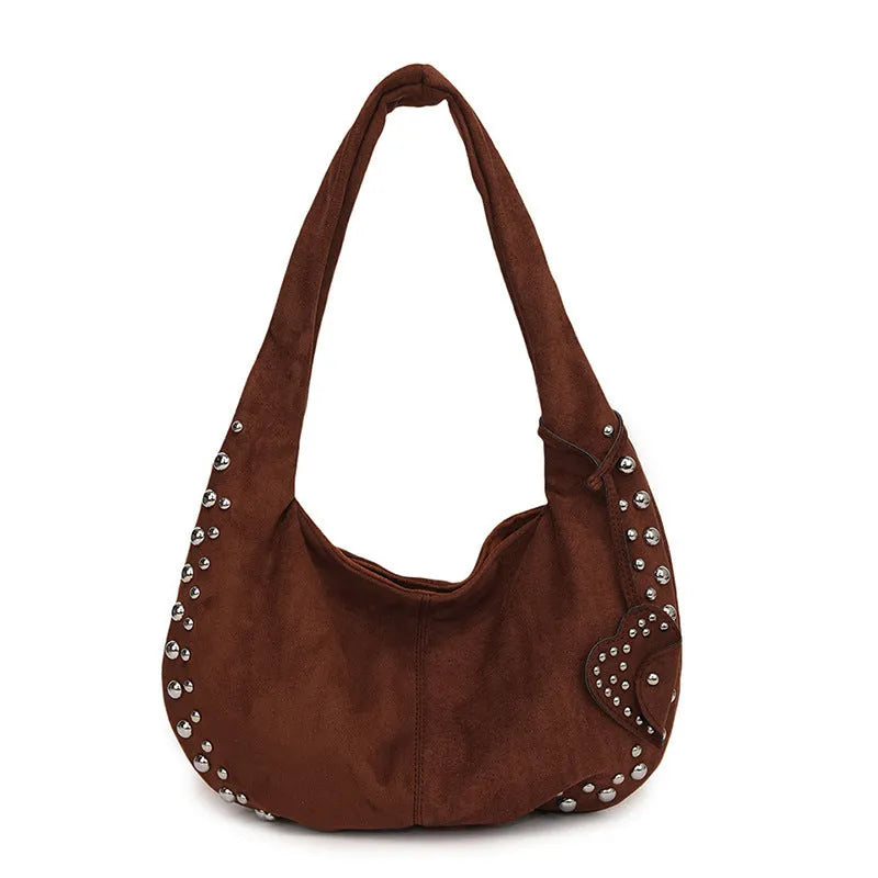 Strapless soft plush underarm tote handbag in a retro style, shown in one of its colour options.