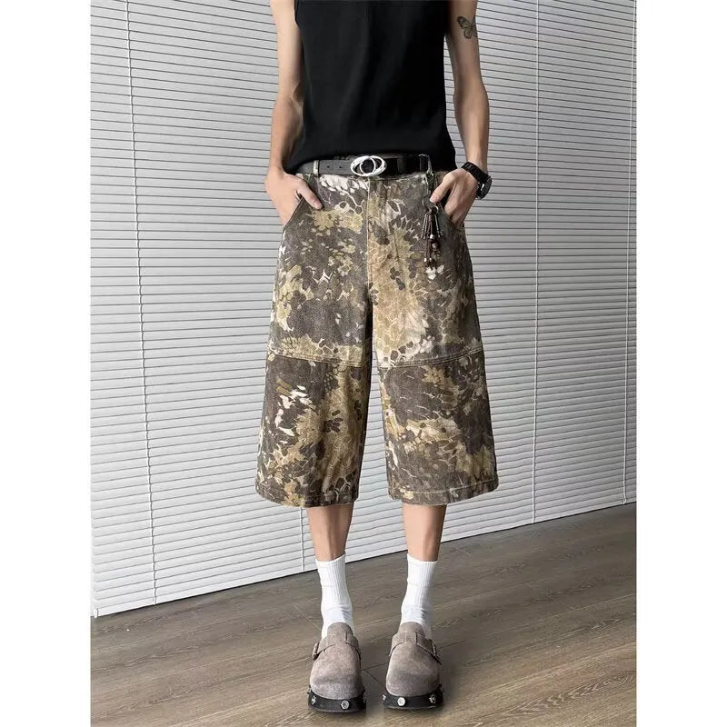 Yellow snake camouflage pattern on cropped denim jeans