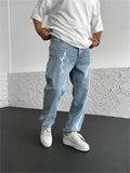 Men's straight-leg denim jeans in medium wash blue with zipper fly and mid-waist design