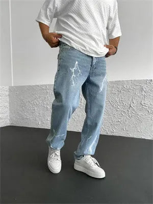 Men's straight-leg denim jeans in medium wash blue with zipper fly and mid-waist design