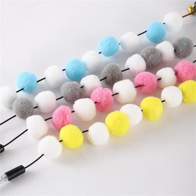 Colourful cat teaser stick with acrylic pompons, feathers, and bell on 31cm lightweight rod