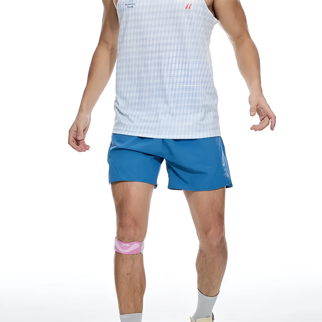 Black and blue four-point running shorts with laser punching stitching details on a mannequin.