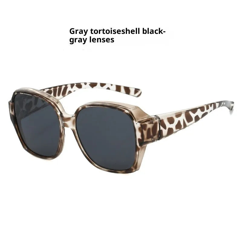 Large rim clip-on polarized sun glasses with black frame and black grey lens UV protection for women driving