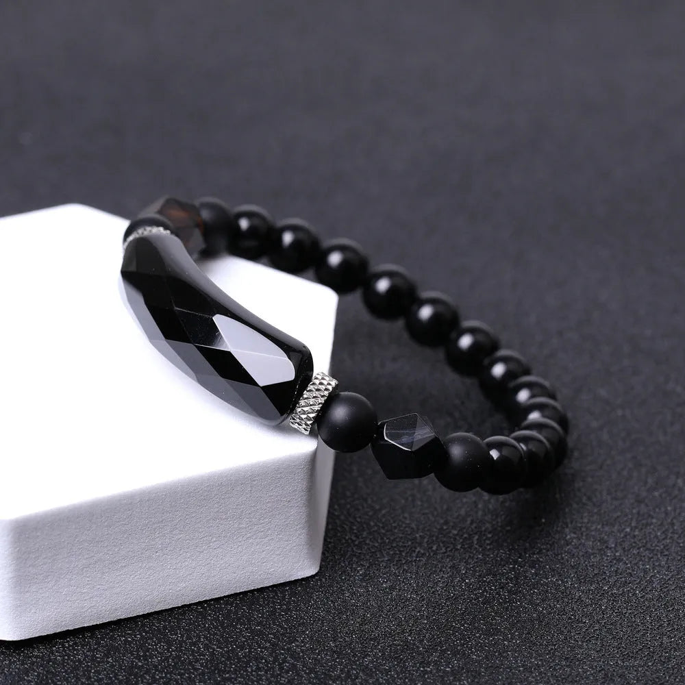 Black agate bracelet with diamond-shaped geometric cut and fan pattern detailing