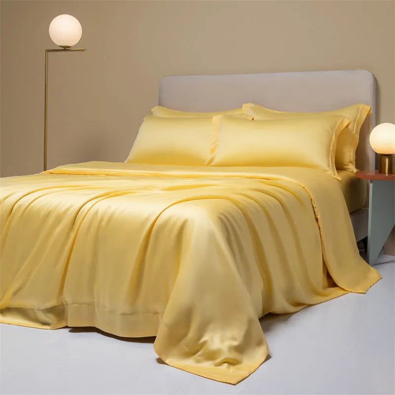 Luxury Lenzing Tencel quilt cover and pillowcase set in a modern style, showing colour options like Aurora Blue.