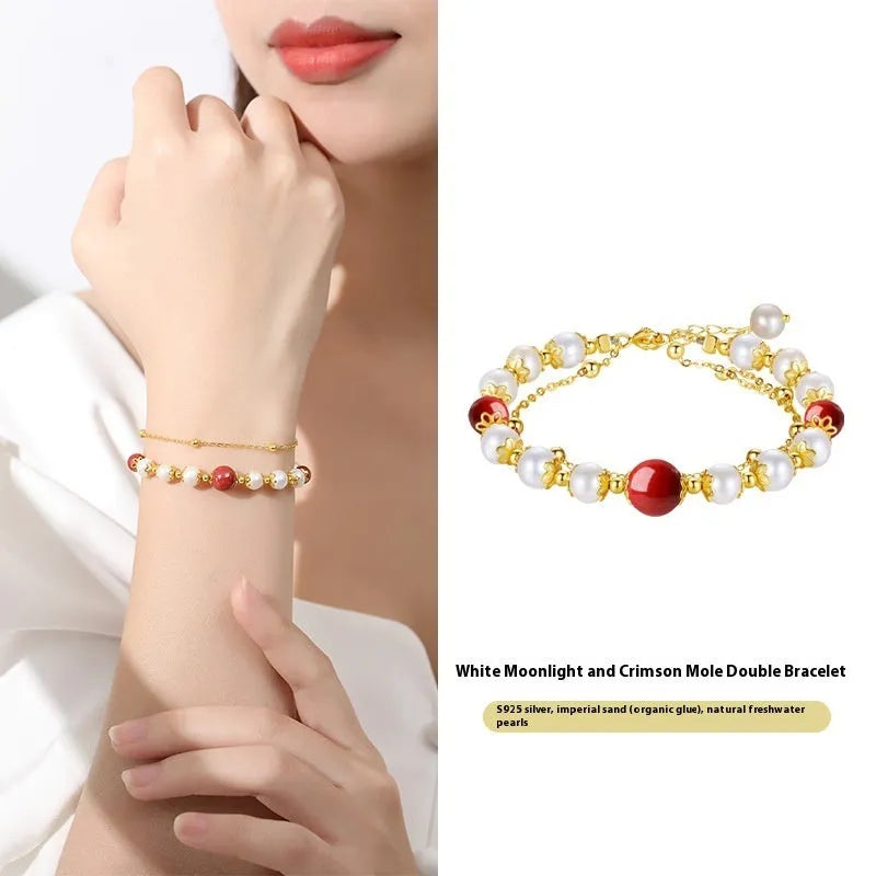 Sterling silver double-layer bracelet with cinnabar red bean and freshwater pearl geometric bean design