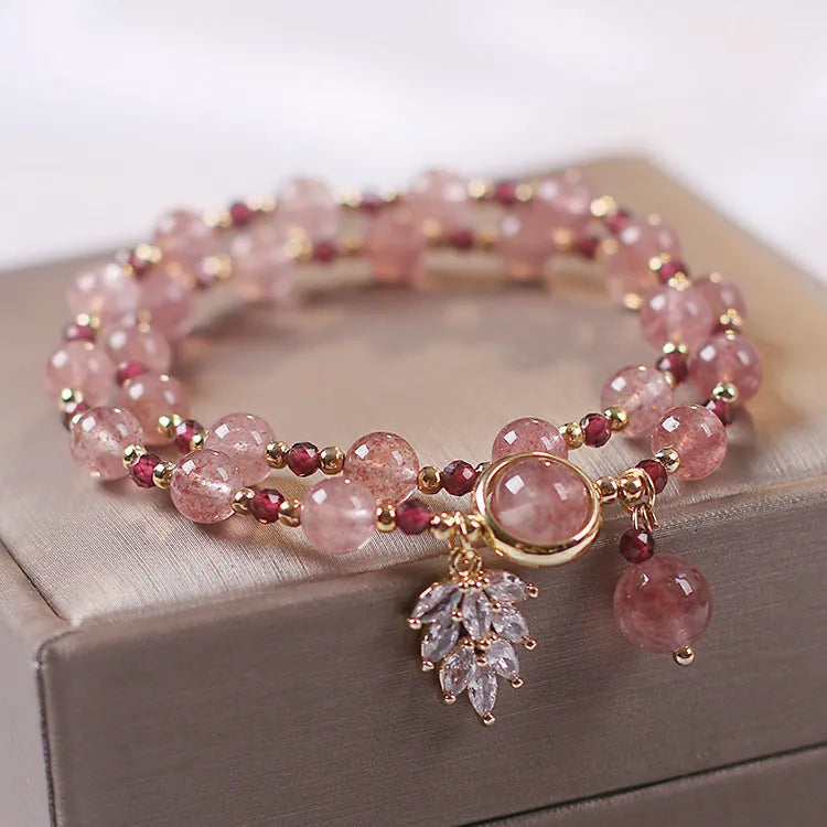 Double layer strawberry quartz bracelet with lucky cat charm and red cat's eye flowers