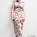 Women's long sleeve printed chiffon dress set with high waist skirt.