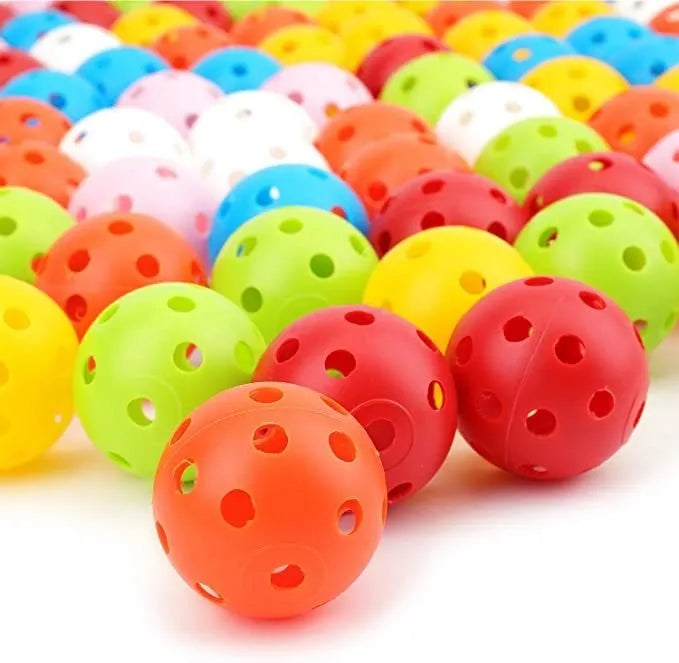 Multi-colour 42mm golf practice balls in red, blue, green, orange, white, and yellow in a net bag