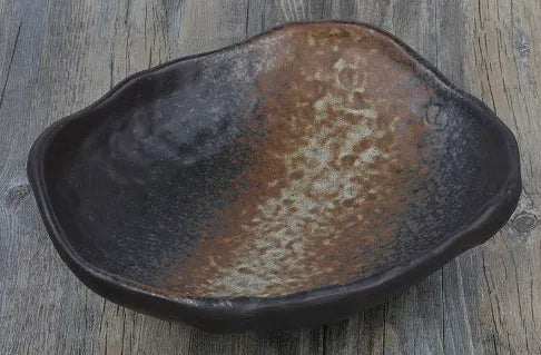 Japanese-style irregular shaped ceramic sashimi bowl with floral decorations measuring 24x21.5x7.5cm