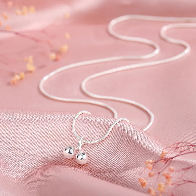 Women's silver cherry necklace with adjustable snake bone chain and fruit pendant