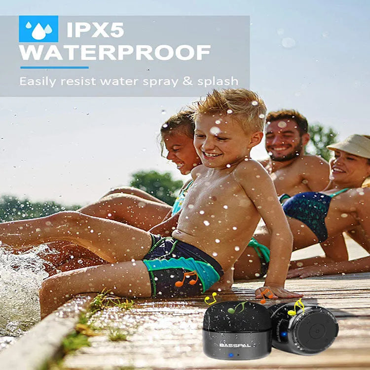 Black waterproof mini Bluetooth speaker with buttons and USB port