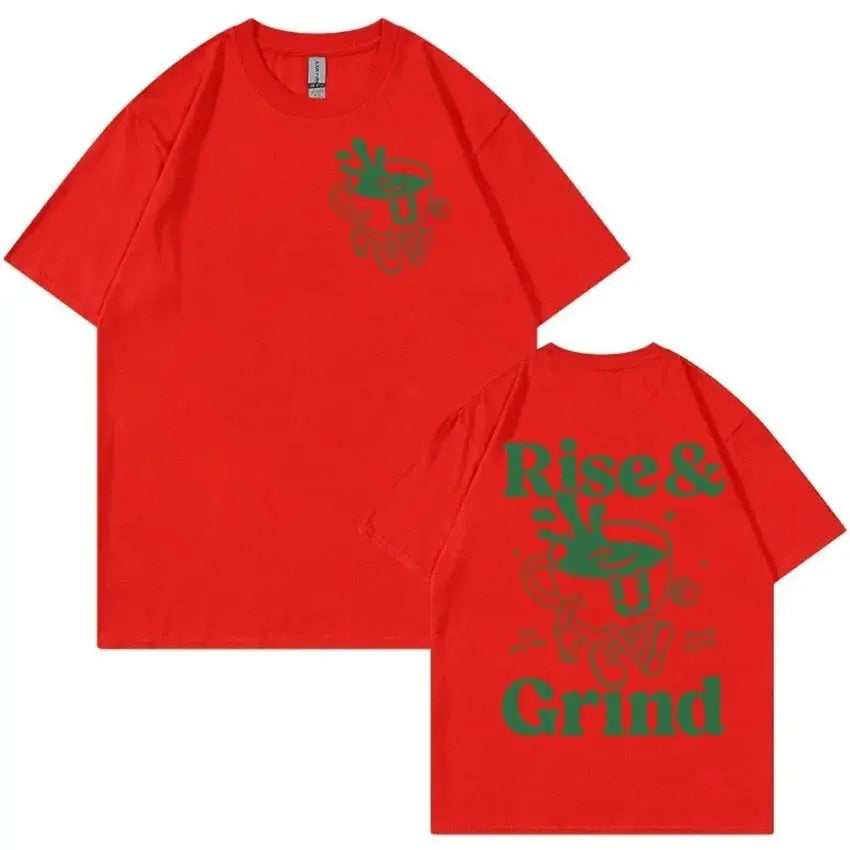 Man wearing a loose black T-shirt with a colourful Rise and Grind coffee cartoon and expression bag graphic.
