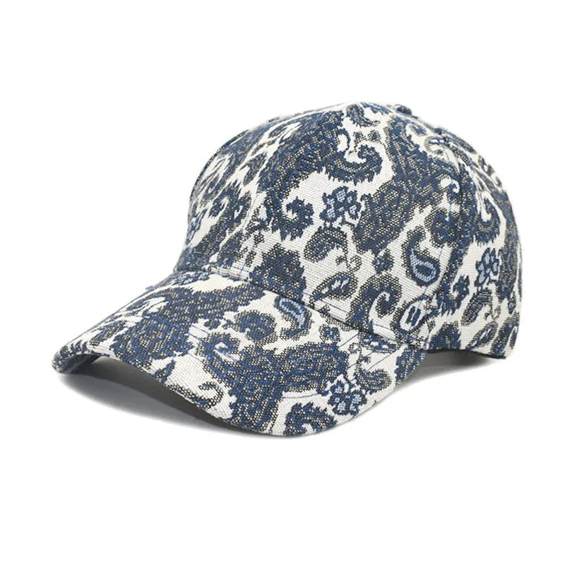 Polyester baseball cap with paisley pattern print in black colour showing dome crown design