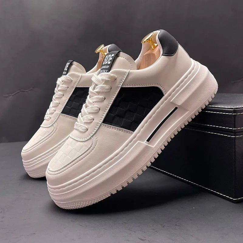 Casual unisex shoes in white with black or green accents, cloth upper with rubber foam sole